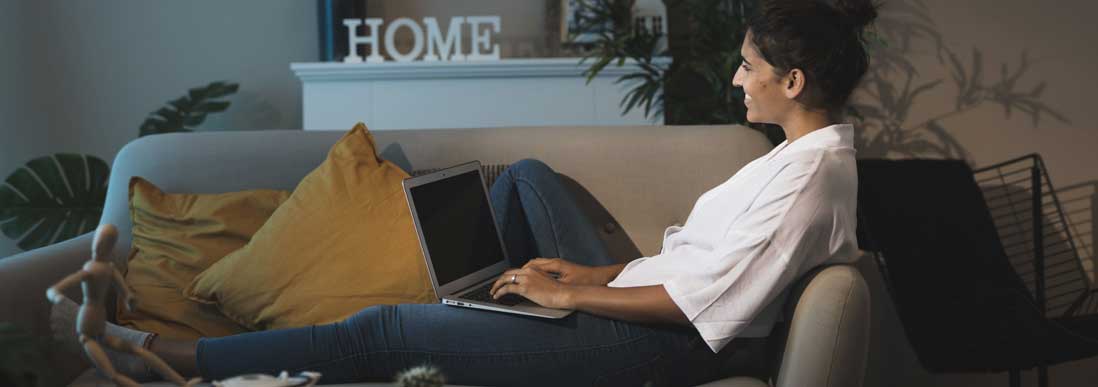 A guest relaxing comfortably in a room